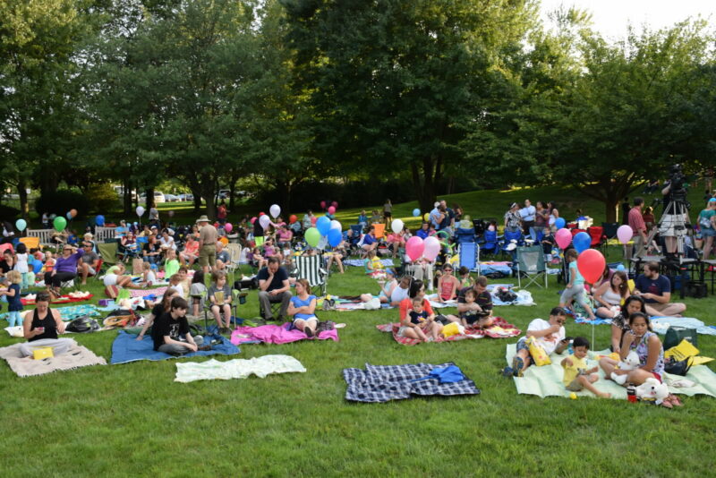 Families enjoying the lawn concert